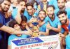 Winning team posing for a group photograph along with trophy at Ganderbal on Saturday.