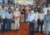 Winners of debate competition posing for a group photograph with SSP Traffic Rural and other dignitaries at Vijaypur on Monday.