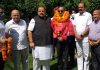 Devender Singh Rana and others welcoming former DIG A K Atri in NC on Saturday.