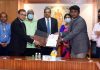 Senior officers of LIC of India and Department of Posts during signing of an agreement in Mumbai.
