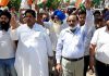 Cong activists led by senior leaders Raman Bhalla and Hari Singh Chib staging protest at Suchetgarh on Saturday.