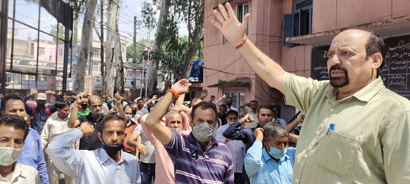 Senior Trade Union leader Som Nath addressing PHE workers sitting on protest dharna at PHE Complex in Udhampur on Thursday. Senior Trade Union leader Som Nath addressing PHE workers sitting on protest dharna at PHE Complex in Udhampur on Thursday.