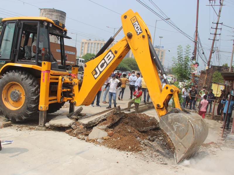 JCB removing illegal structure. -Excelsior/Rakesh JCB removing illegal structure. -Excelsior/Rakesh
