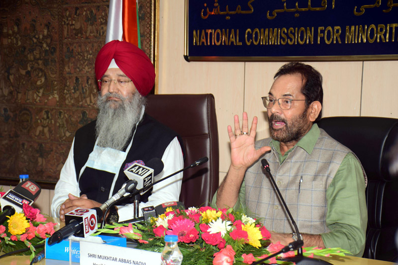 Chairperson of National Commission for Minorities Iqbal Singh Lalpura and Union Minister for Minority Affairs Mukhtar Abbas Naqvi addressing a press conference, in New Delhi on Friday. (UNI)