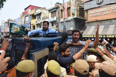 Protesting students being whisked away by cops on Thursday. Protesting students being whisked away by cops on Thursday.
