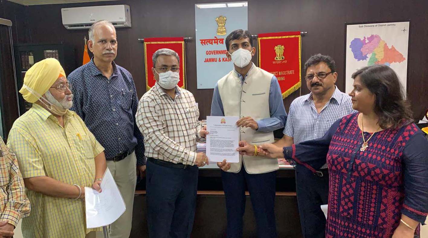 President CAIT Neeraj Anand submitting memorandum to DC Jammu Anshul Garg. President CAIT Neeraj Anand submitting memorandum to DC Jammu Anshul Garg.