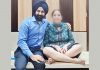 Dr Ranjit Singh and patient posing for photograph after knee replacement.