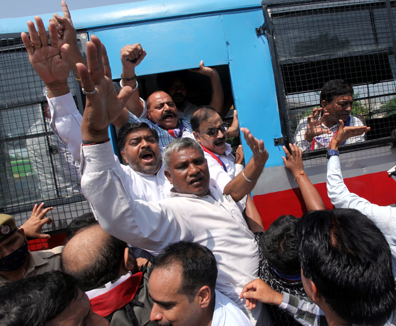 Apni Trade Union leaders and activists being detained by police during protest on resumption of Darbar move practice at Jammu on Monday. - Excelsior/Rakesh Apni Trade Union leaders and activists being detained by police during protest on resumption of Darbar move practice at Jammu on Monday. - Excelsior/Rakesh
