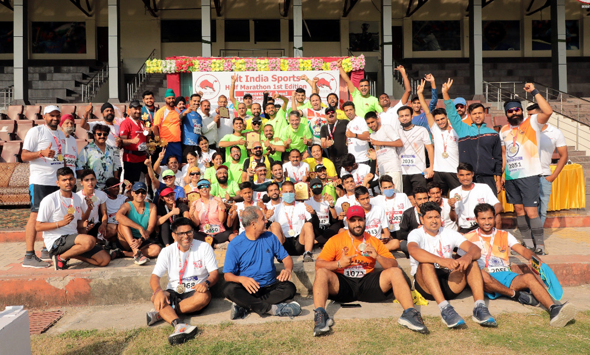 Winners and participants of the half marathon posing for a group photograph at MA Stadium Jammu. Winners and participants of the half marathon posing for a group photograph at MA Stadium Jammu.