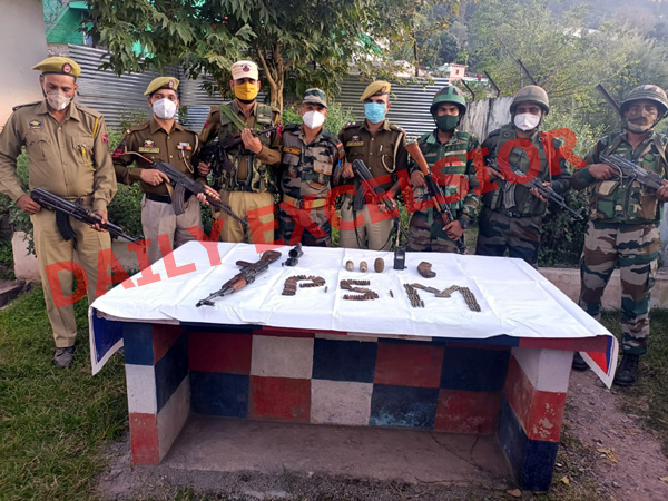 Arms and ammunition recovered in Mahore area of Reasi on Friday. -Excelsior/Romesh Mengi Arms and ammunition recovered in Mahore area of Reasi on Friday. -Excelsior/Romesh Mengi