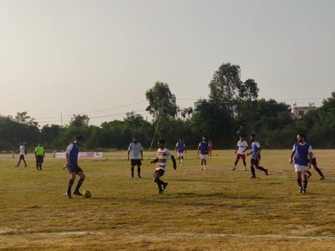 Players in action during a footbaal match at Sainik Ground, Sainik Colony in Jammu.