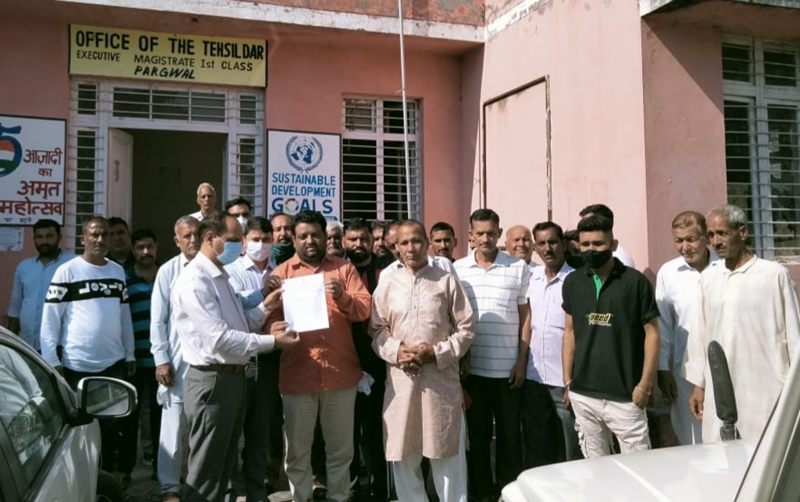 Memorandum being submitted for compensation to rain hit farmers. Memorandum being submitted for compensation to rain hit farmers.