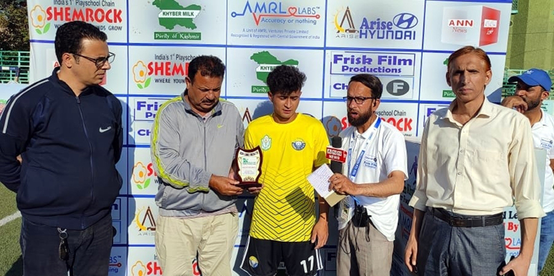 A player being awarded with man of the match by dignitaries at Srinagar. A player being awarded with man of the match by dignitaries at Srinagar.