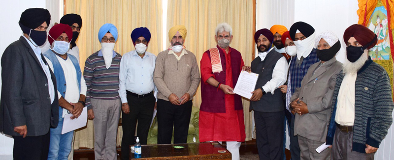 Sikh delegation submitting memorandum to Lt. Governor at Srinagar. Sikh delegation submitting memorandum to Lt. Governor at Srinagar.