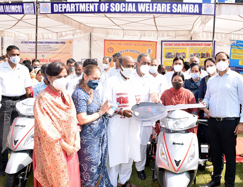 Union Minister for Social Justice, Dr Virendra Kumar presenting motorized tricycle to a beneficiary in Samba on Friday. Union Minister for Social Justice, Dr Virendra Kumar presenting motorized tricycle to a beneficiary in Samba on Friday.