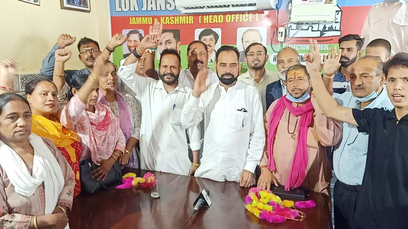 LJP J&K UT president Rafiq Malik posing with new entrants during party function in Jammu on Sunday. LJP J&K UT president Rafiq Malik posing with new entrants during party function in Jammu on Sunday.