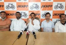 NPP chairman Harsh Dev Singh addressing press conference in Jammu on Sunday.