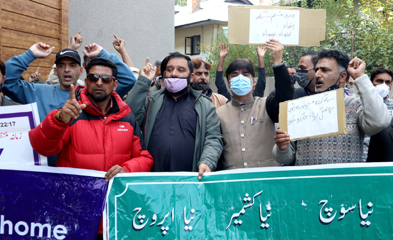 JKNPF leaders and workers staging protest against civilian killings in Srinagar on Tuesday. —Excelsior/Shakeel