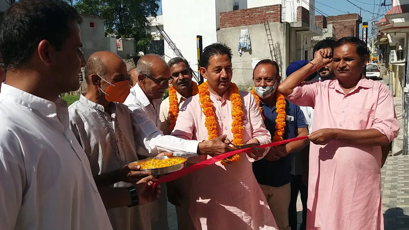 Corporator, Baldev Singh Billawaria inaugurating lanes and drains in Preet Nagar on Sunday.