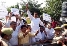 JKNPP leaders during a protest at Jammu on Tuesday.