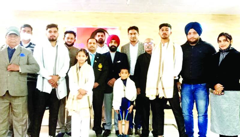 JKPYC president Udhey Bhanu Chib posing for a group photograph with winner at Jammu. JKPYC president Udhey Bhanu Chib posing for a group photograph with winner at Jammu.