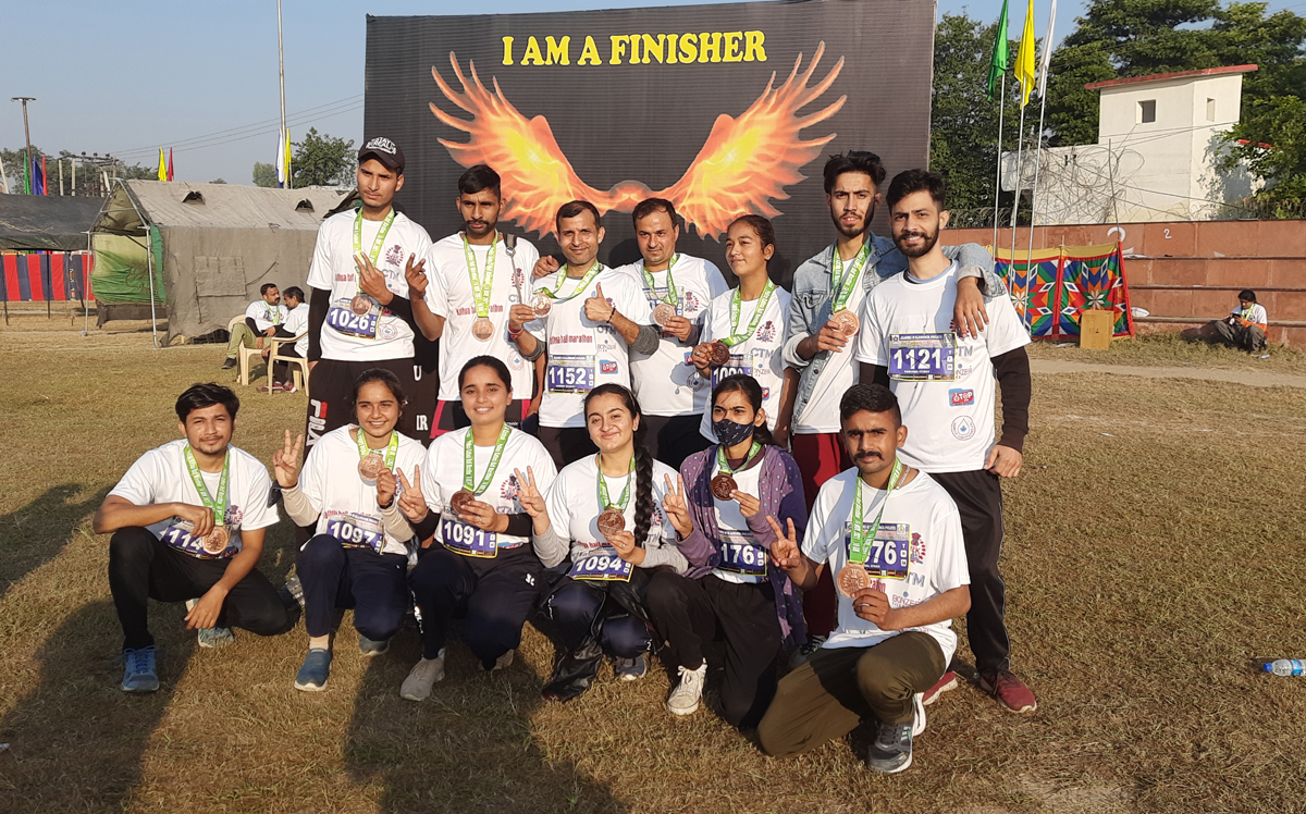 Winners of 2nd Half Marathan posing for photograph. Winners of 2nd Half Marathan posing for photograph.