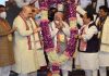 Prime Minister Narendra Modi being received with a garland at the inauguration of BJP National Executive Meeting at NDMC Convention Centre in New Delhi on Sunday.(UNI)