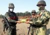 BSF and Rangers exchange sweets on IB in Jammu sector.