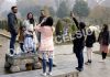Tourists in Srinagar’s Mughal Garden on Friday. —Excelsior/Shakeel
