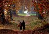 Girls take a walk under beautiful Chinar trees during autumn season at Nishat Bagh in Srinagar on Tuesday. (UNI)