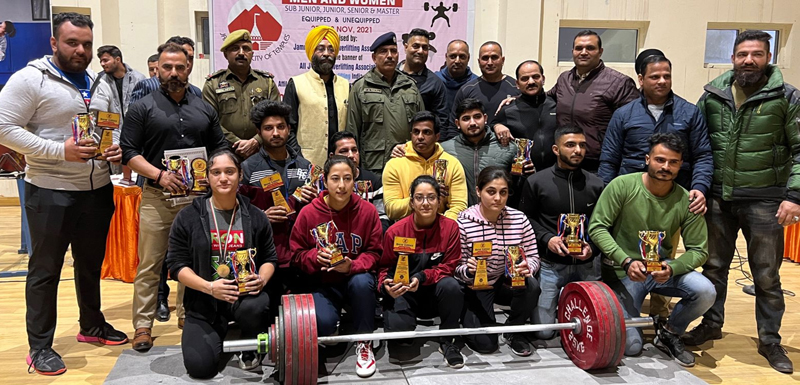 Winners posing for a group photograph along with dignitaries at Indoor Hall Bhagwati Nagar Jammu.