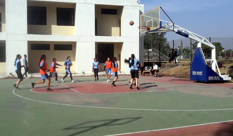 Players in action during a Basketball match at University of Jammu on Monday. Players in action during a Basketball match at University of Jammu on Monday.