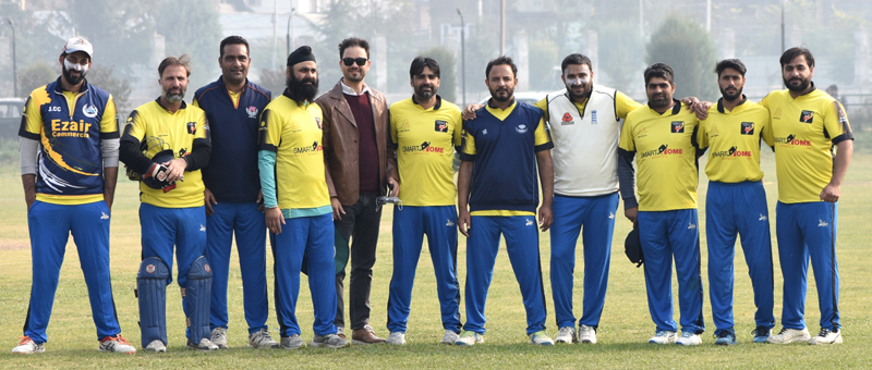 Winning team posing for a group photograph along with dignitaries at Srinagar. Winning team posing for a group photograph along with dignitaries at Srinagar.