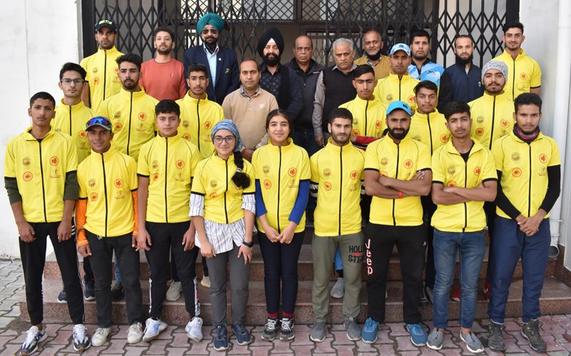 Selected cyclists posing for a group photograph with dignitaries at MA Stadium on Wednesday. Selected cyclists posing for a group photograph with dignitaries at MA Stadium on Wednesday.