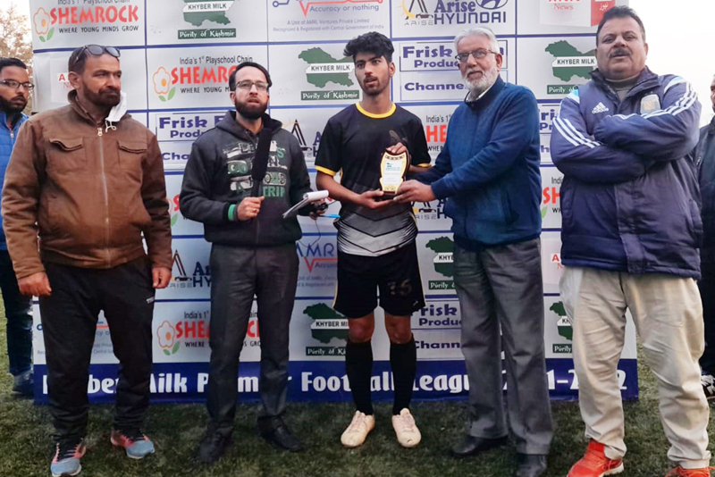 A player being awarded by dignitaries at Srinagar. A player being awarded by dignitaries at Srinagar.