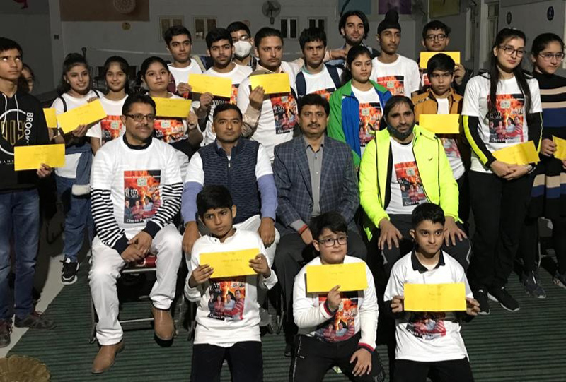 Winners of Chess League displaying meritorious certificates along with dignitaries at Jammu. Winners of Chess League displaying meritorious certificates along with dignitaries at Jammu.