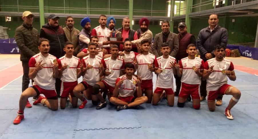 Winning team players receiving title trophy from dignitaries. Winning team players receiving title trophy from dignitaries.