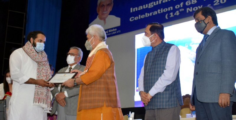 Lt Governor distributing registration certificates of cooperatives during the inaugural day of 68th Cooperative Week in Jammu. Lt Governor distributing registration certificates of cooperatives during the inaugural day of 68th Cooperative Week in Jammu.