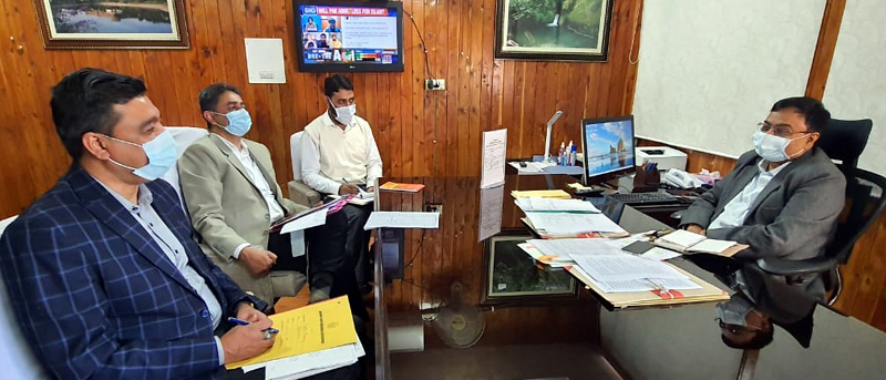 Commissioner Secretary GAD, M K Dwivedi chairing a meeting. Commissioner Secretary GAD, M K Dwivedi chairing a meeting.