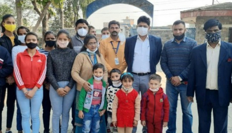 Div Com Raghav Langer posing for a group photograph with Children of SOS at Gol Gujral. Div Com Raghav Langer posing for a group photograph with Children of SOS at Gol Gujral.
