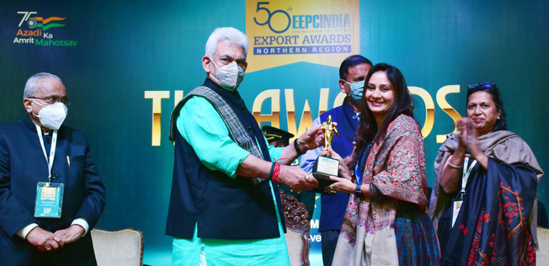 Lt Governor presenting award to a winner in Jammu on Wednesday. Lt Governor presenting award to a winner in Jammu on Wednesday.