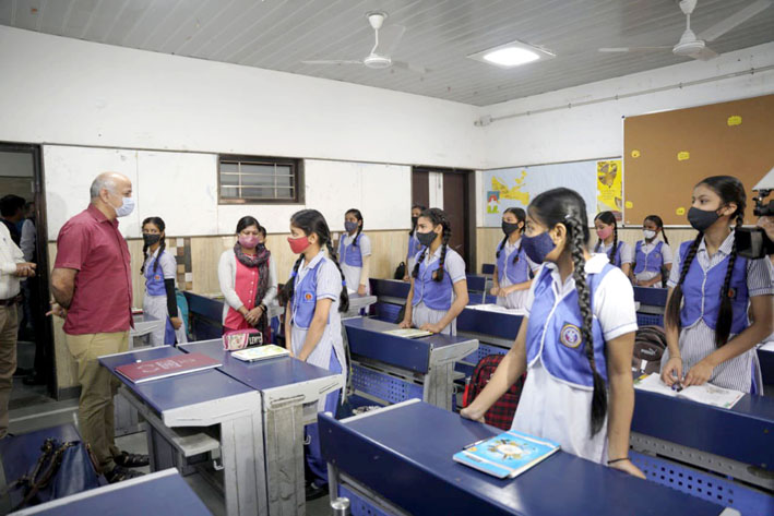 Delhi Deputy Chief Minister Manish Sisodia inspecting Rajkiya Sarvodaya Bal/Kanya Vidyalaya in West Vinod Nagar as schools reopen, in New Delhi on Monday. (UNI) Delhi Deputy Chief Minister Manish Sisodia inspecting Rajkiya Sarvodaya Bal/Kanya Vidyalaya in West Vinod Nagar as schools reopen, in New Delhi on Monday. (UNI)