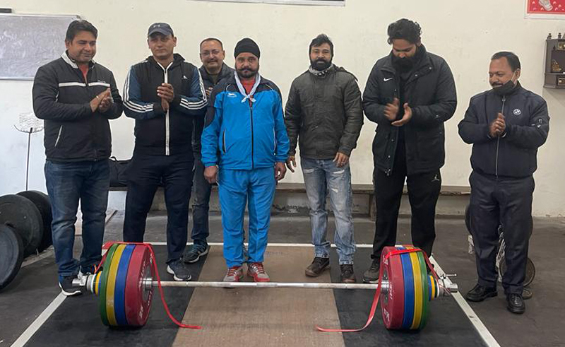 Officials of JKWA and coaches during the handing over ceremony of the Weightlifting set at MA Stadium Jammu. Officials of JKWA and coaches during the handing over ceremony of the Weightlifting set at MA Stadium Jammu.