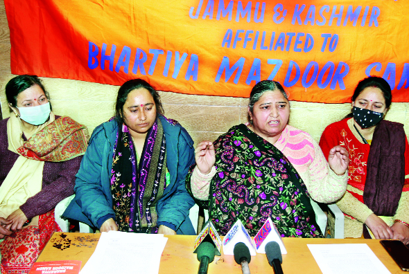 adddd Anganwadi Workers Welfare Association, president, Swarna Choudhary addressing press conference in Jammu on Wednesday. -Excelsior/Rakesh
