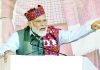 Prime Minister Narendra Modi addressing a rally during launch of various development initiatives of Himachal Pradesh in Mandi on Monday. (UNI)