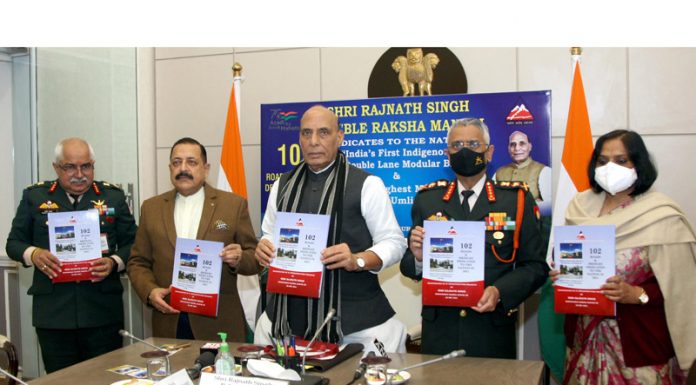 Defence Minister Rajnath Singh and MoS in PMO Dr Jitendra Singh among others releasing publication during the virtual inauguration of 27 projects of BRO in New Delhi on Tuesday. (UNI)