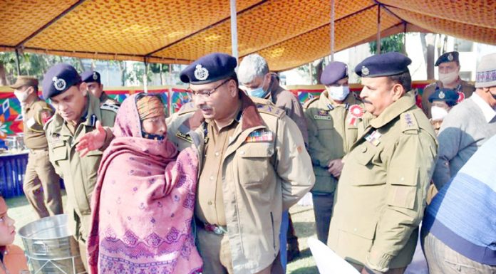 DGP Dilbag Singh interacting with family member of a police martyr at DPL Kathua.