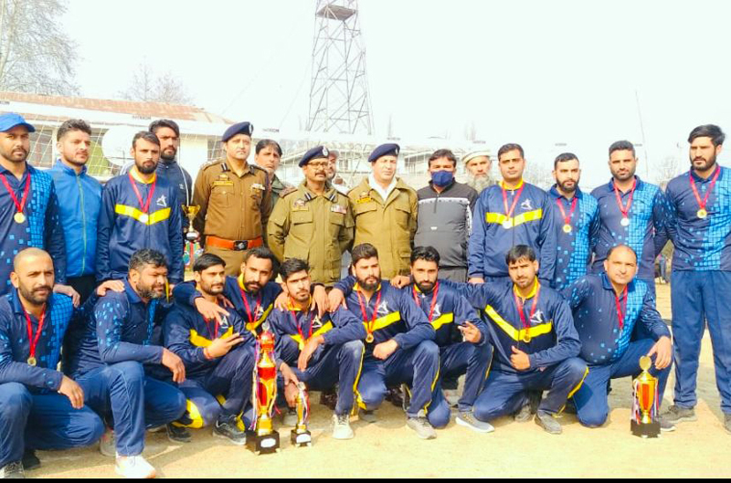 Winning team posing for a group photograph with DIG South Kashmir Abdul Jabbar and Commandant 11th Battalion, Sandeep Mehta at Anantnag.