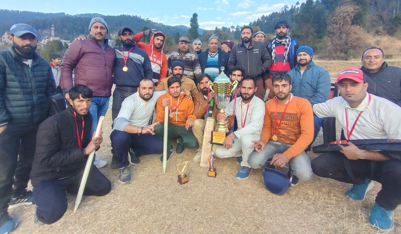 Winners posing for a group photograph by holding a trophy at Bhaderwah. Winners posing for a group photograph by holding a trophy at Bhaderwah.
