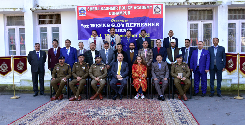 page11-2 Dignitaries and participants of refreshers course posing for group photograph.